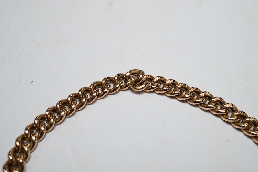 A 9ct god curb link bracelet, with heart shaped padlock clasp, 18cm, 13.8 grams. Condition - fair to good